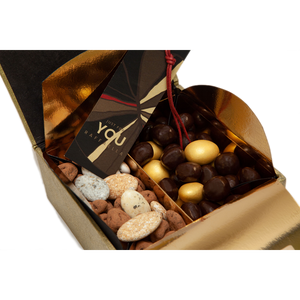 Handmade luxury gift box in Zen graphic, personalized. Content: chocolate confetti, truffled ginger, orange dragées, gold dragées.