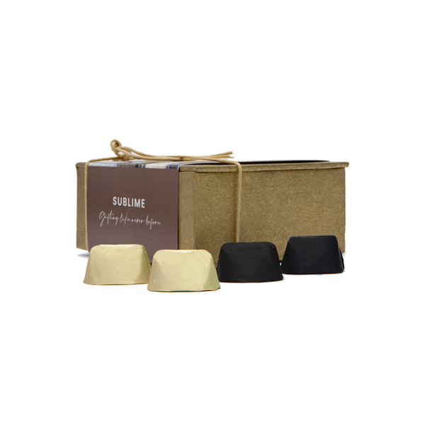 Handmade personalized luxury gift box with dark pralined chocolate mini Gianduiotto and classic pralined mini Gianduiotto..